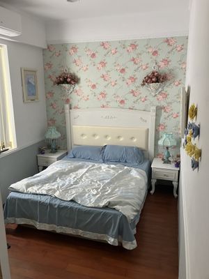 the very comfortable bed / room   at Loving Hut Paradise Island in Penghu