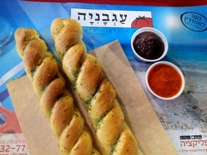 fresh garlic bread with olive and pepper sauce at Agvania Pizza in Eilat
