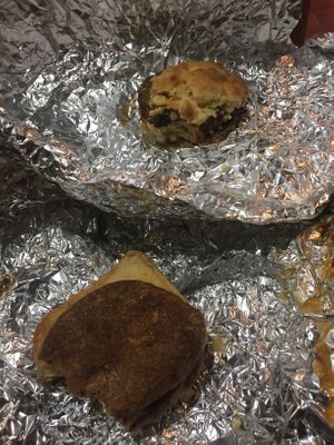 The partially Eatin killer tofu and beginning of not a mc breakfast sandwich  at Sea Salt & Cinnamon in Muncie