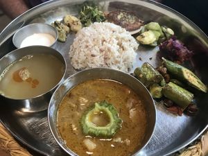 My husband usually orders this. They recently harvested the rice and it was delicious! at Niceness in Nago