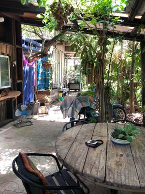 Outdoor seating and bathroom  at Niceness in Nago