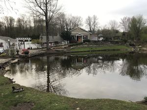 Campus with ducks in the pond at Greenhouse Cafe & Tavern in Burlington