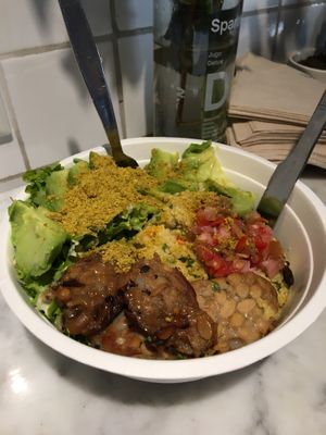 Tempeh bowl + avocado (palta) + dressings at Sparaw - Recoleta in Buenos Aires