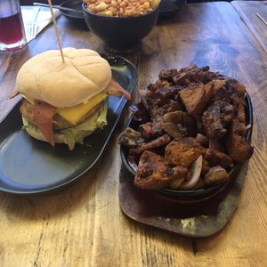 Chicken and bacon burger and sizzler. All vegan.  at Mr Singh's in Wolverhampton