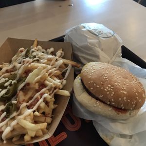 Dirty fries covered in vegan mayo, cheese, bacon bits and jalapeños  at Greazy Vegan in Cardiff