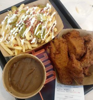 Southern fried chicken, gravy and dirty fries  at Greazy Vegan in Cardiff