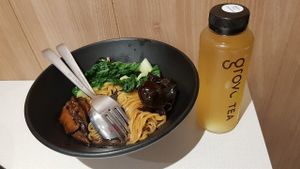 Dry Truffle Ramen Noodles with passion fruit chamomile tea at Grove Cafe 素林 - Paya Lebar in Central Singapore