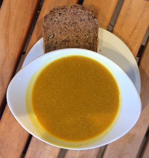 Vegan curried pumpkin soup with whole-grain bread at Naturgut  in Leinfelden-echterdingen