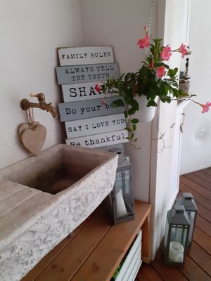 detail of the outdoor dinner area at Un Tempo Per Te - Vegan B&B in Dro