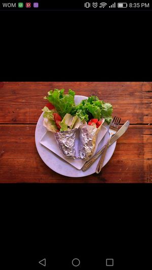 Vegan wraps with hummus, guacamole, black beans, corn, and more! at Napas in Pica