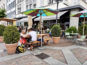 Outdoor seating at car-free square at Tibits in Winterthur