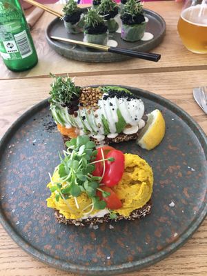 Two open faced sandwiches: avocado and curry at Plant Power Food in Copenhagen
