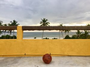 View of the ocean from the rooftop yoga shala.  at Green Peace Inn in Weligama