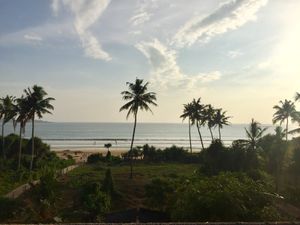 View of the ocean from the rooftop yoga shala.  at Green Peace Inn in Weligama