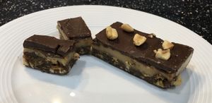 Raw, Vegan, GF 'Snickers'' bar . . . a takeaway yesterday, enjoyed now! at Cafe Piccolo in Weymouth