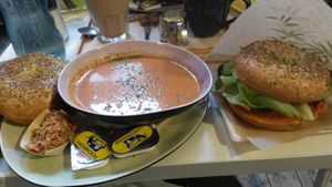 Soup (with bagel) and vegan bagel. We love bagels. Ignore the butter packets, we did! at Li O Lait in Bruges