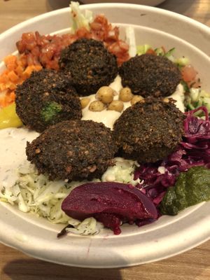 Salad bowl with hummus and falafel at Chickpea in Haarlem
