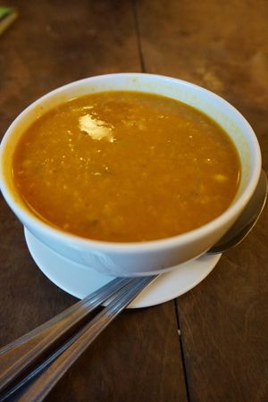 Lentil and coconut milk soup with curry spices. Delicious. at Momo in Krakow