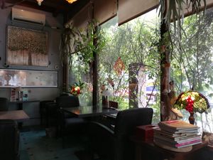 window-side dining area at Flower Space 花草空間 - HuāCǎo KōngJiān in Hualien