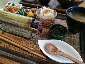steamed purple rice in bamboo with side dishes at Flower Space 花草空間 - HuāCǎo KōngJiān in Hualien