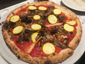 Marinara pizza with yellow zucchini, black olives, and maitake and grain.  at 800 Degrees - Shinjuku in Tokyo