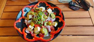 Greek salad (with tofu feta, olives, cucumber, onion, pepper, radish, tomato) at Brew and Breakfast in Da Lat