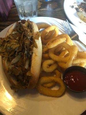 vegan Philly cheesesteak w/ vegan onion rings! at Bourbon & Branch in Philadelphia