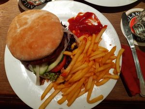 Vegan winter burger with fries at Cafe Vienna in Mannheim
