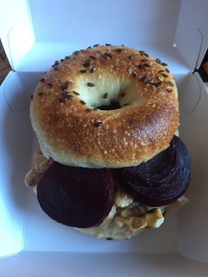 Vegan bagel with hummus beets and walnuts at Beigelistai  in Vilnius