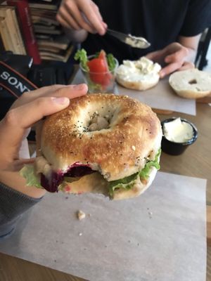Vegan bagel with bean paste and beet, in the back a Cream cheese bagel (vegetarian) at Beigelistai  in Vilnius