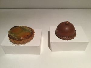 Pistachio/pear tart and Hazelnut, pear mousse and biscuit inside "The Dome" at Jo and Nana Cakes in Paris