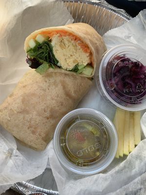 Hummus & Veggie Wrap (with included sides) 🤤  at Shayna B's By The Sea in Westbrook