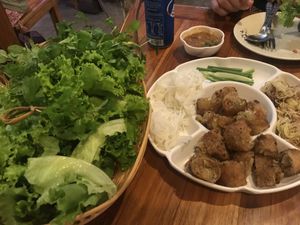 Build your own - crispy springroll pieces are wrapped in salad with herbs & banana blossom at Phonheuang Cafe in Luang Prabang