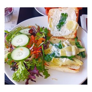 Spinach & Artichoke Sandwich +side salad at The Vegan Nest in Clinton