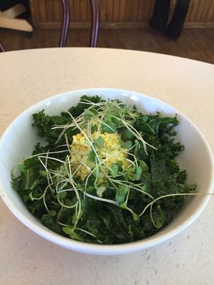 Warm green breakfast bowl at The Vegan Nest in Clinton