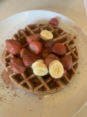 Spelt waffle with seasonal fruit  at The Vegan Nest in Clinton