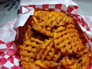 Half order of sweet potato waffle fries at Heavenly Buffaloes in Durham