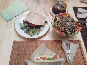 Burger, tempeh wrap and tempeh salad 

Yammi! at Peas in Athens