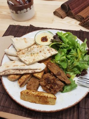 Platter (tofu, seitan, pita and salad) at Peas in Athens