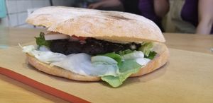 Vegan burger with vegan cheese at Peas in Athens