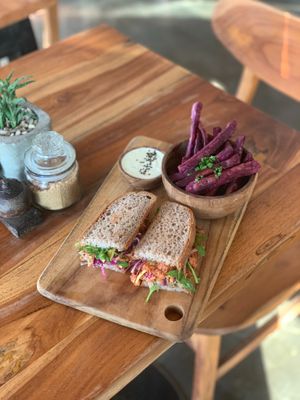 jackfruit burger on gf (upon request) 
yogurt sauce on side (not vegan)
sweet potato fries at The Loft in Canggu