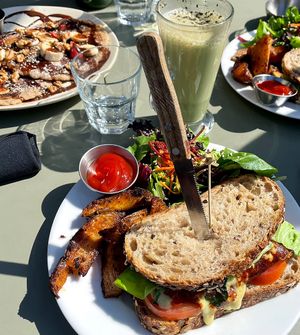 Pancakes and breakfast sandwich  at Hello 123 in Toronto