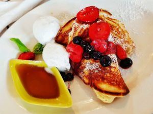 Pancakes and a paper on a Sunday morning..  at Nature Cafe/Bar in Frankston