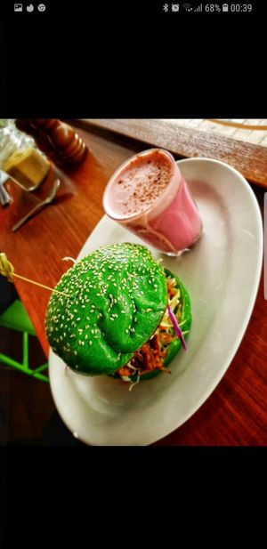Pulled Jack Fruit burger and Beetroot Latte.. both delicious. ☺  at Nature Cafe/Bar in Frankston