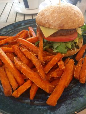 Southern style 'chicken' burger with sweet potato fries... amazing   at Nature Cafe/Bar in Frankston