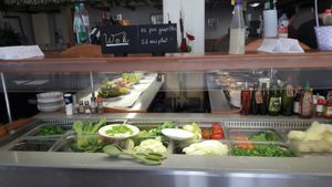 Buffet of wok, choose what you want and they stir fry for you with sauce at Restaurant Pékin in Nice