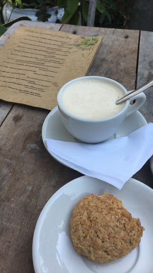Cold soy milk coffee with a vegan coconut cookie of some sort. Yum!  at Maracuya in Flores
