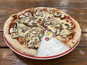 Champion mushroom pizza with vegan cheese  at VEG in Poprad