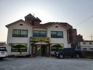 Outside view of the restaurant. It's located next to a large church. at Namhan Mountain - 남한산성 in Iksan