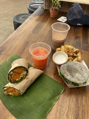 Mexican wrap and burger with air fried chips. Juice and iced chocolate to wash it down  at Fruibies in Kuranda